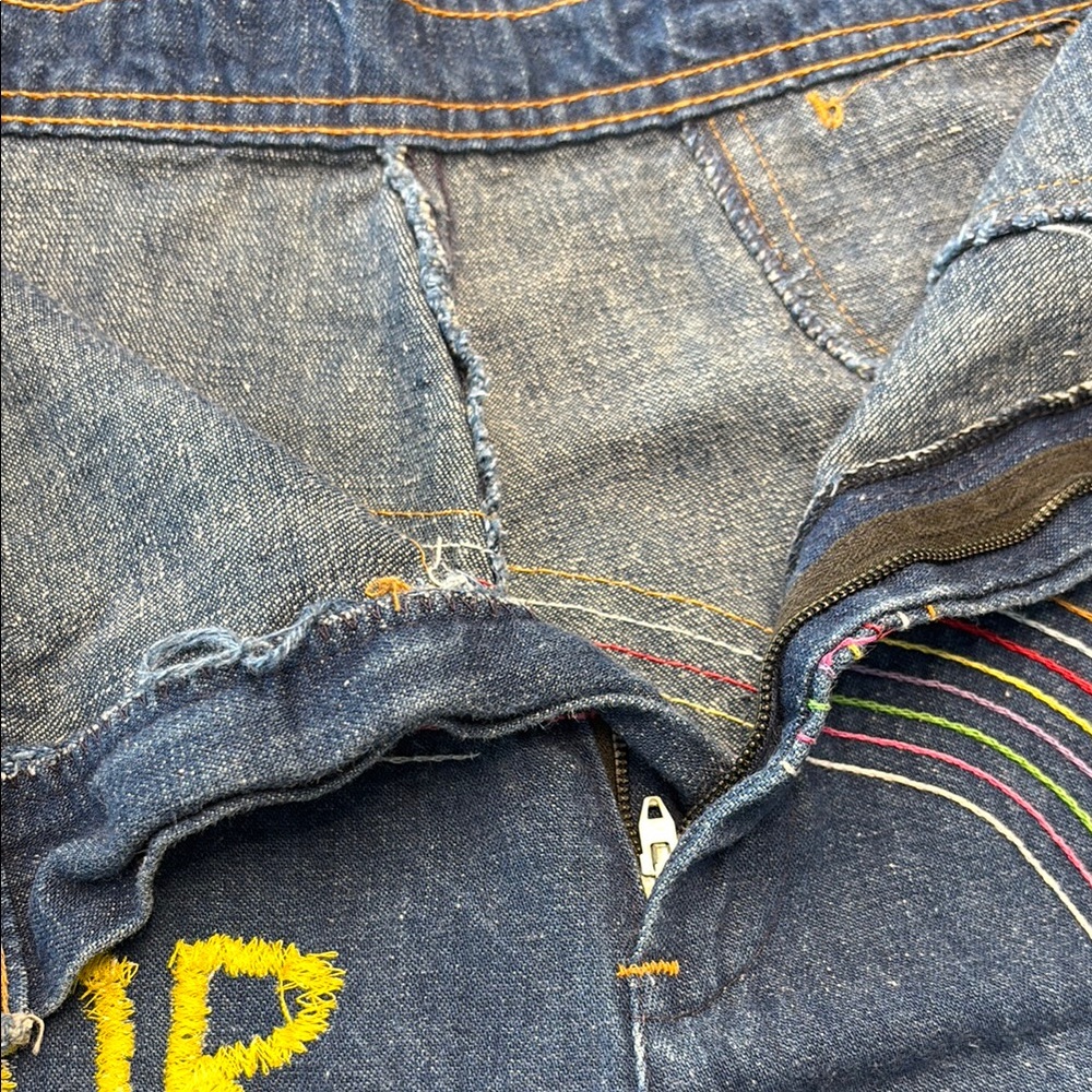 Embroidered Blue Jeans with Colorful Accents
